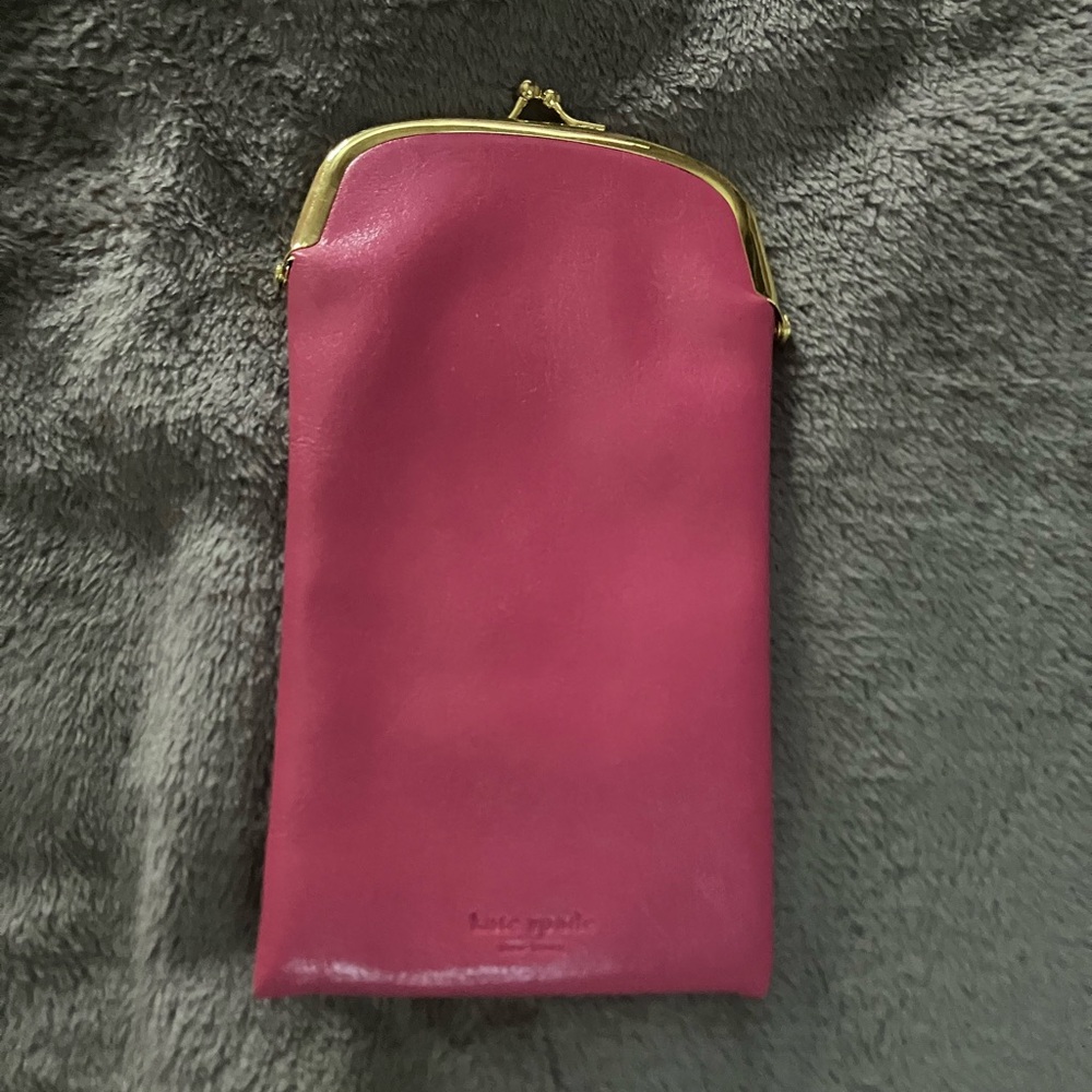 Kate spade coin pouch 7 1/2 inches from top to bottom and 4 inches!